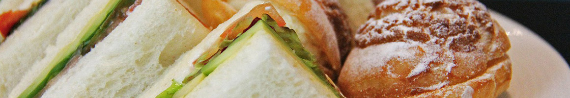 Eating American (New) Sandwich at Kitt's Kornbread Sandwich and Pie Bar restaurant in Jefferson, TX.